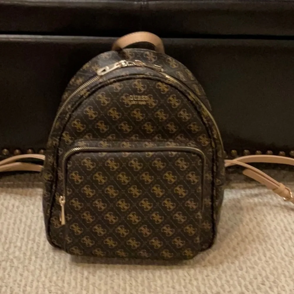 Guess | Bags | Guess Monogram Brown Backpack | Poshmark display picture 2